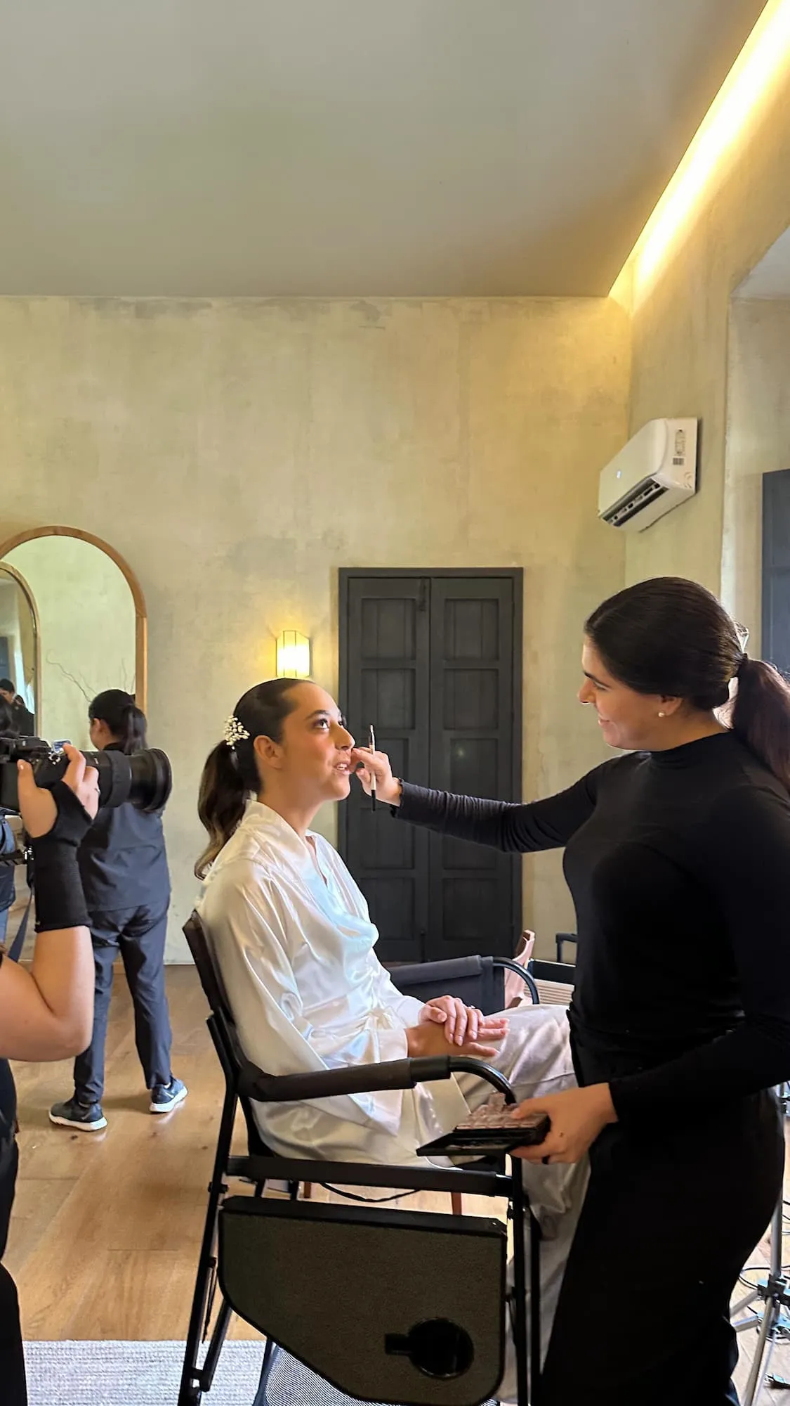Behind the scenes — bridal makeup application on the wedding morning